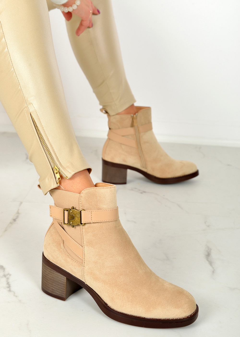 Beige clasp detail heeled ankle boots 1