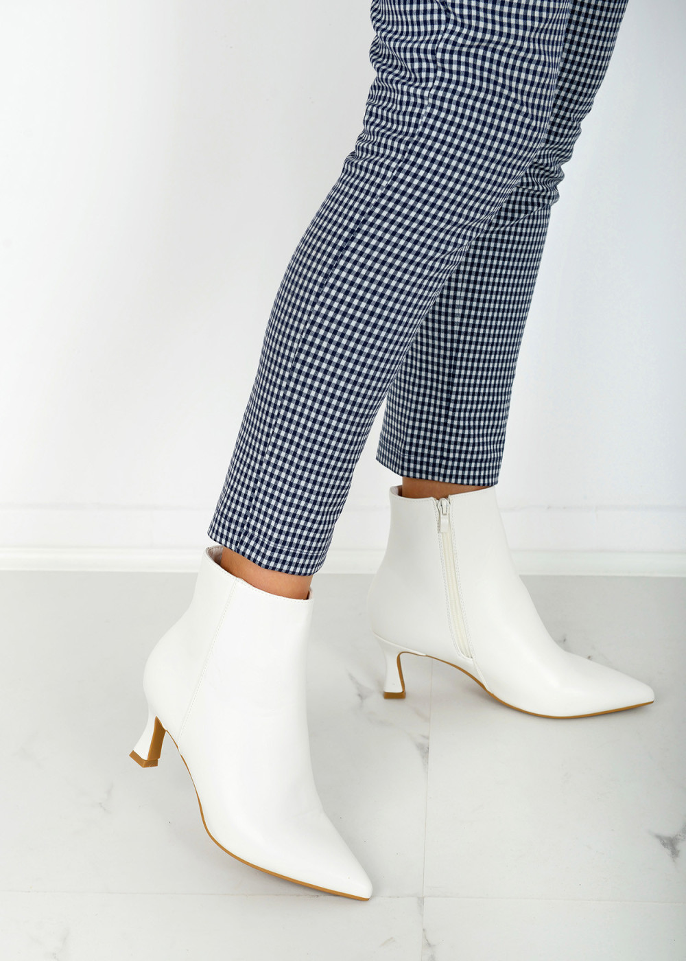 White pointed toe heeled ankle boots 1