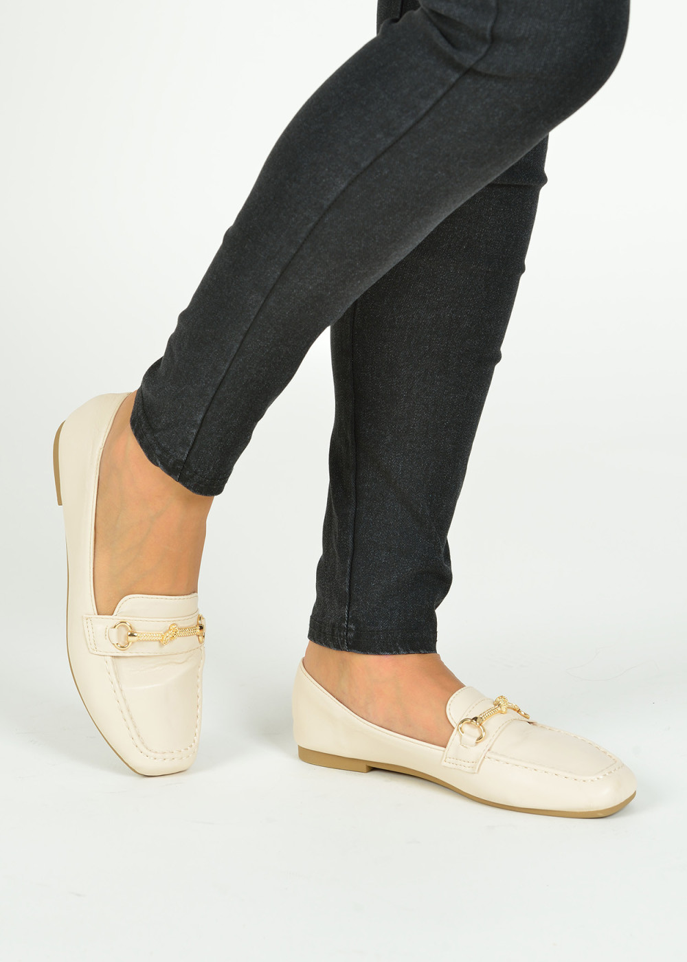 Beige gold knot detail loafers 1