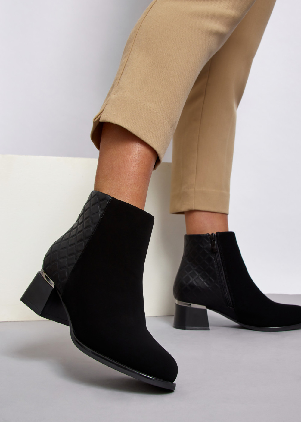 Black diamond pattern heeled ankle boots 1
