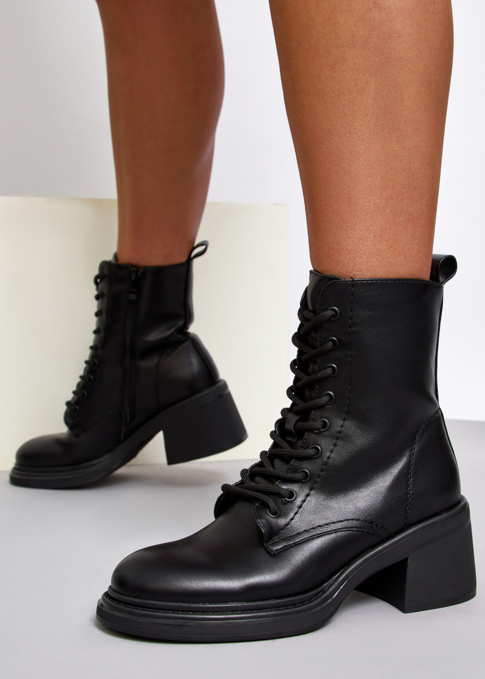 Black lace up heeled ankle boots 4