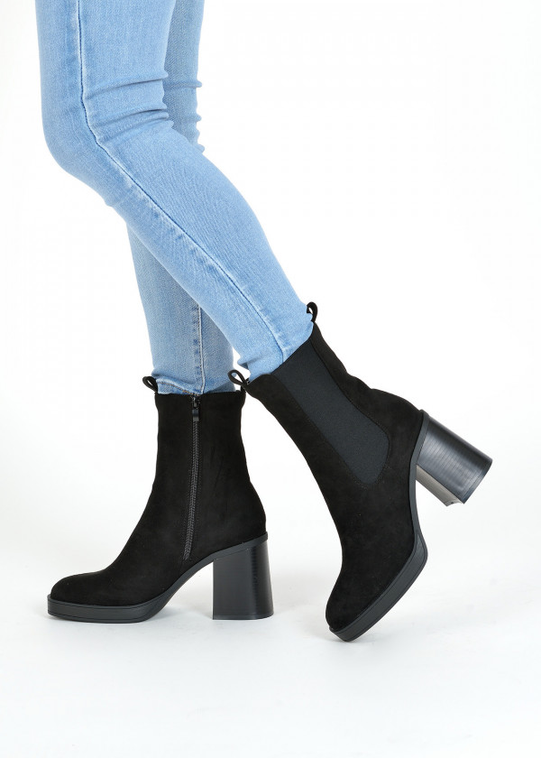 Black heeled midi boots