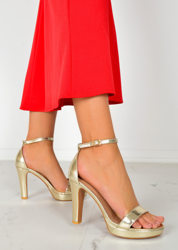 Gold platform heeled sandals 1