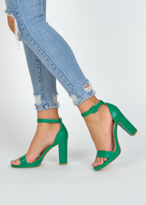 Green platform heeled sandals