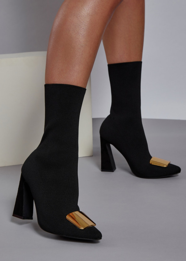 Black gold buckle heeled sock boots