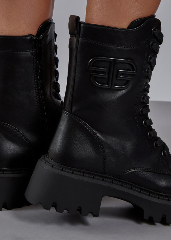 Black brooch detailed chunky army boots 1