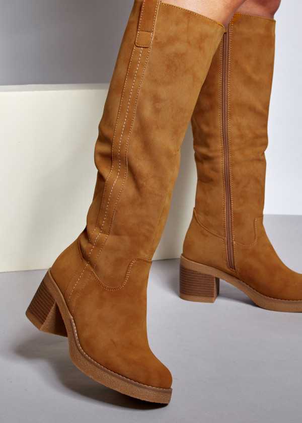 Brown tan heeled knee high boots