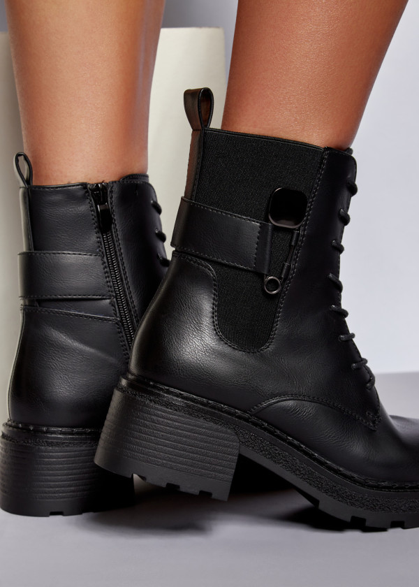 Black safety pin detailed ankle boots 1