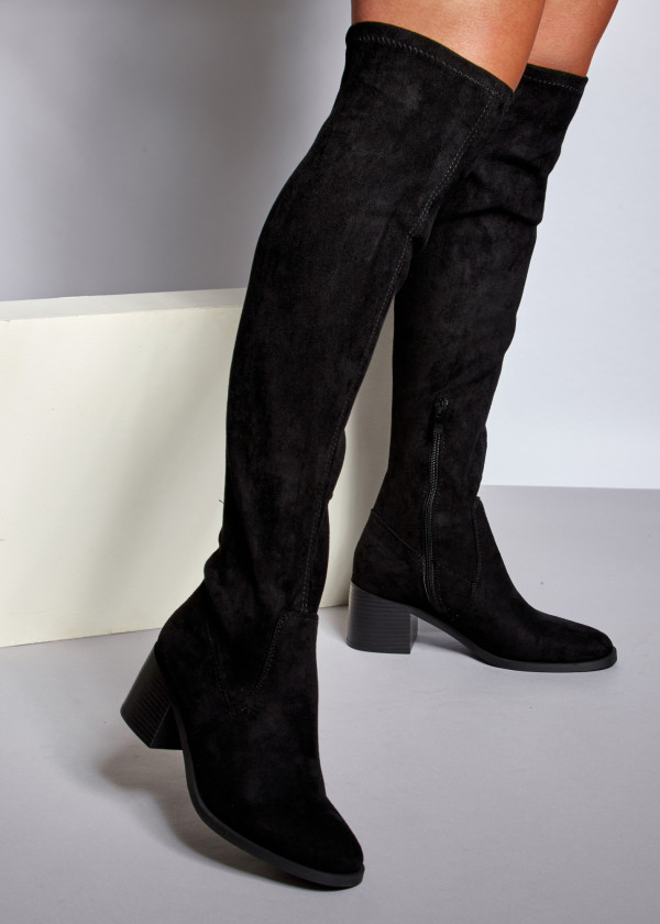 Black heeled over the knee boots