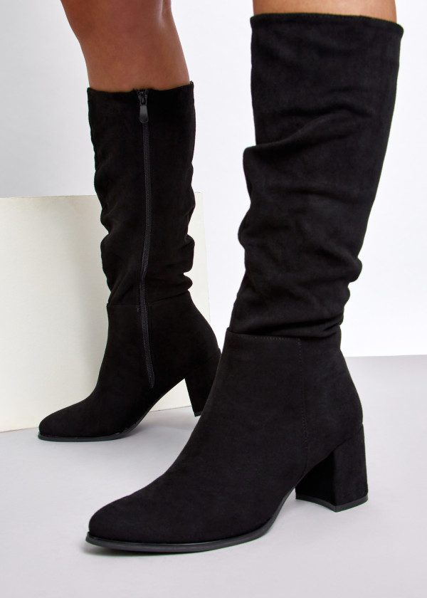 Black slouched heeled knee high boots 4