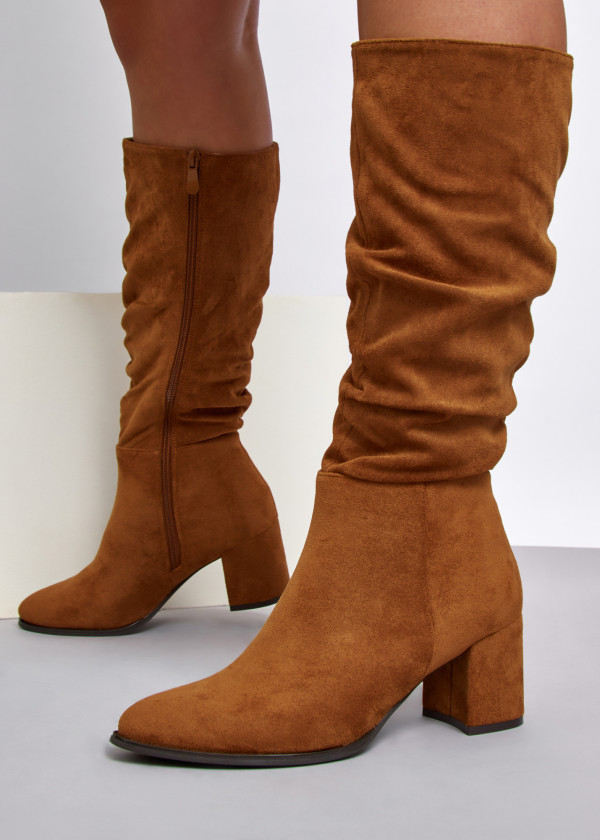 Tan slouched heeled knee high boots 1