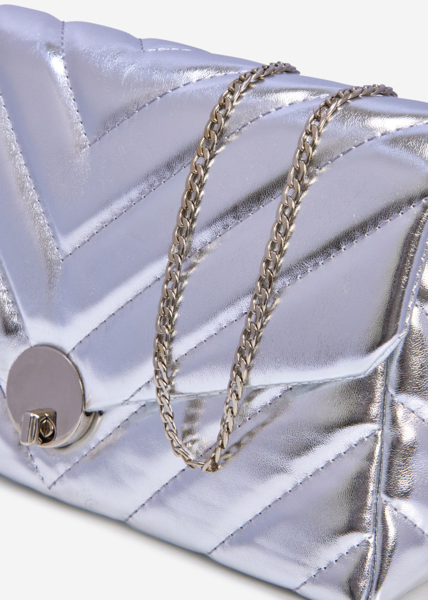 Silver quilted puffer clutch bag 2