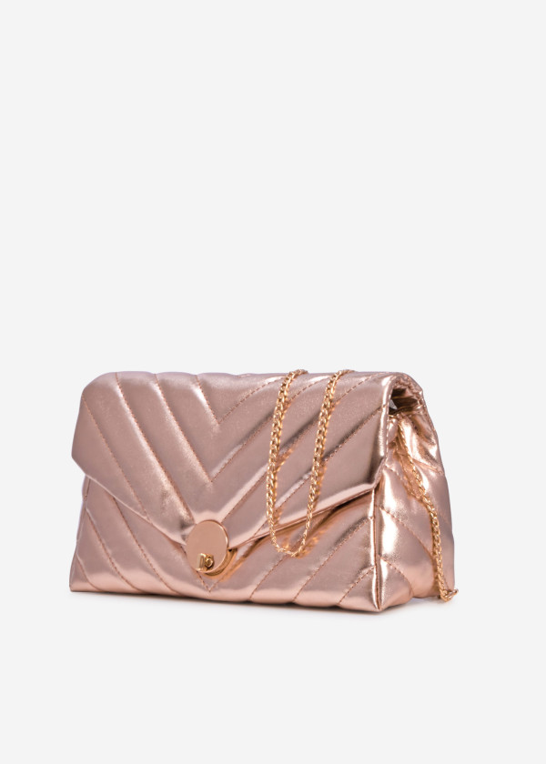 Rose gold quilted puffer clutch bag 1