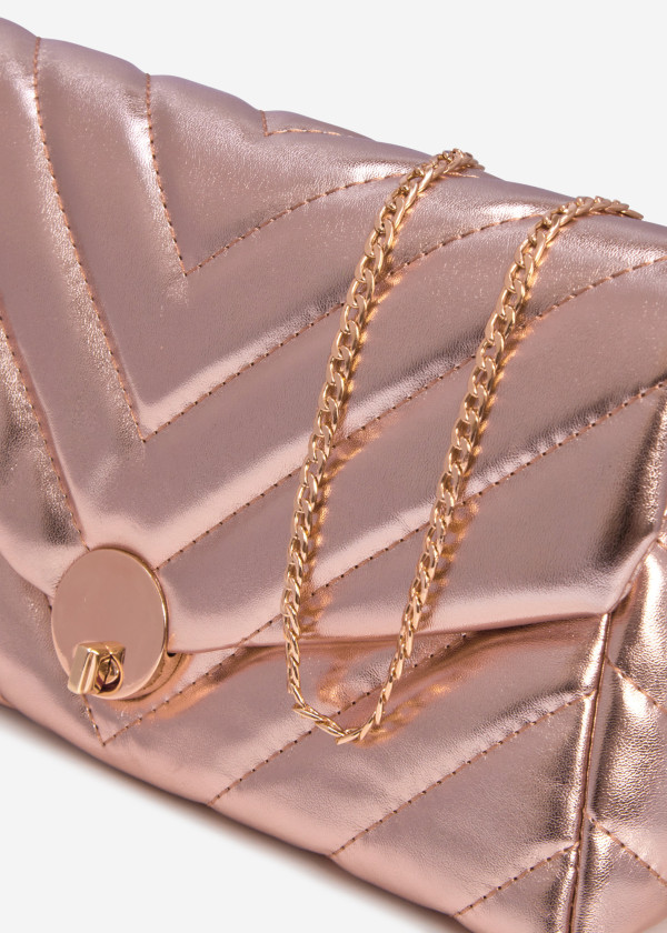 Rose gold quilted puffer clutch bag 3