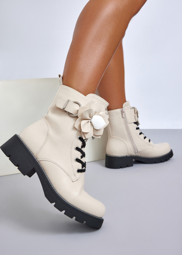 Beige combat boots with floral feature