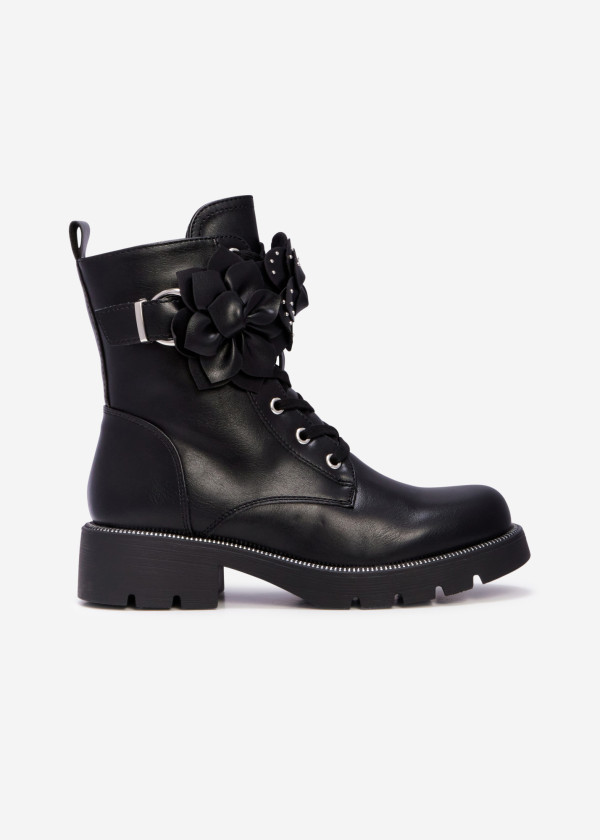 Black combat boots with floral feature 3