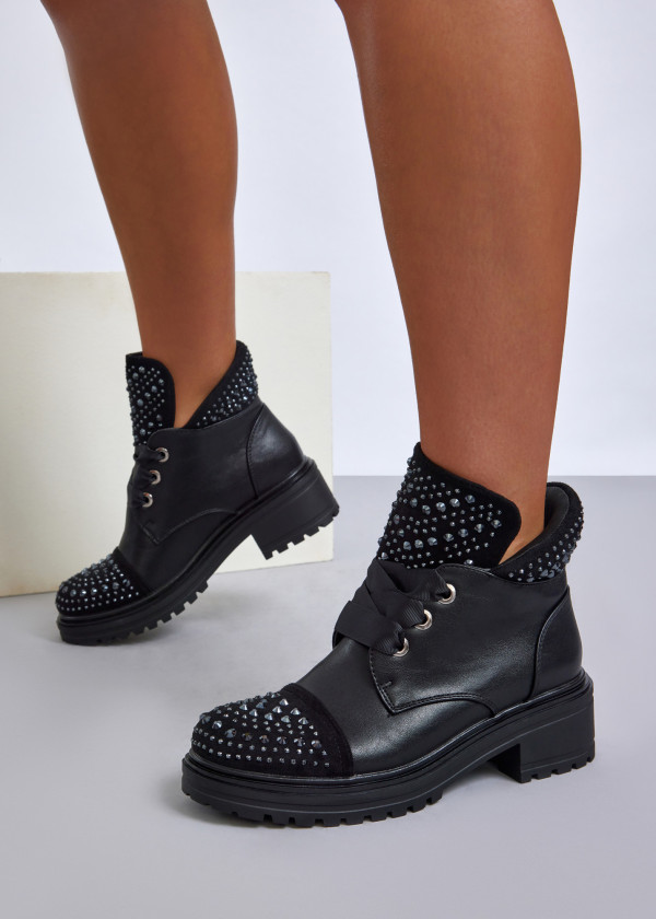 Black studded combat boots with satin ribbon laces