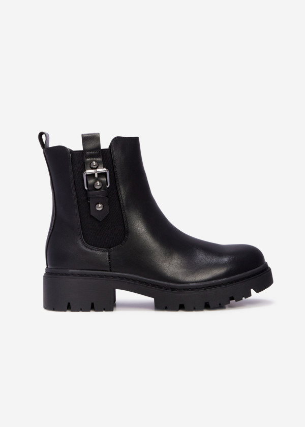 Black chelsea boots with buckle accent 2