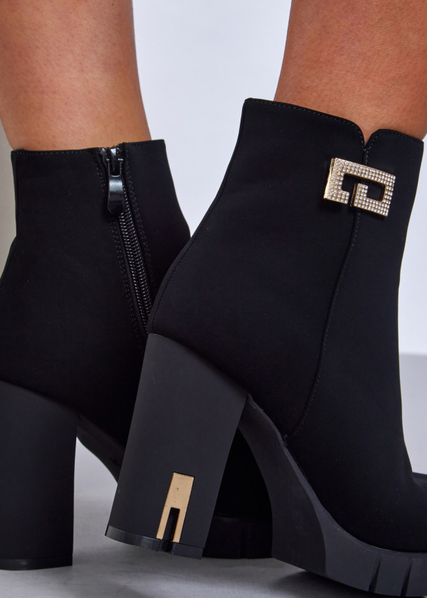 Black high heel ankle boots with gold accent 2