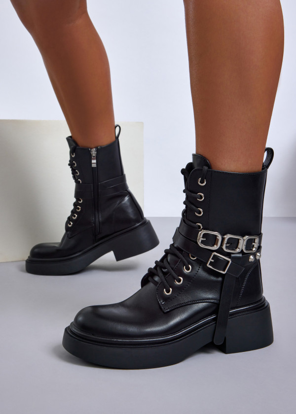 Black combat boots with double buckle detail