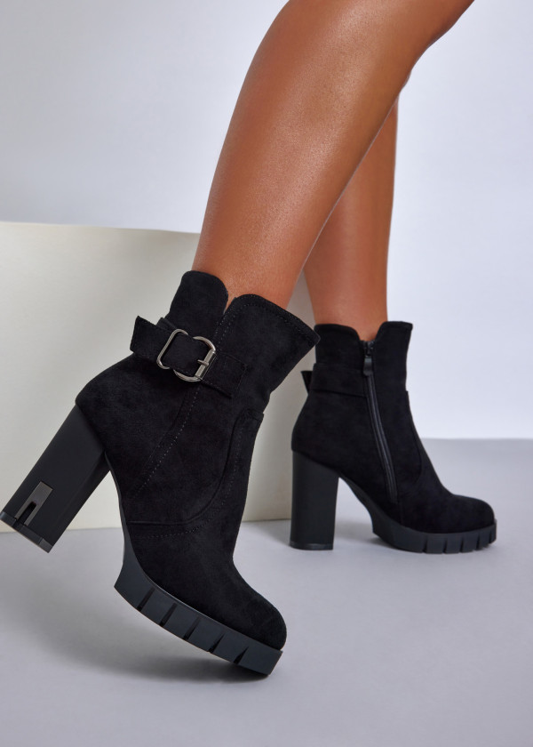 Black ankle boots with metallic buckle detail 1